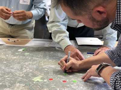 Members of the mobility plan team working on mapping the area.